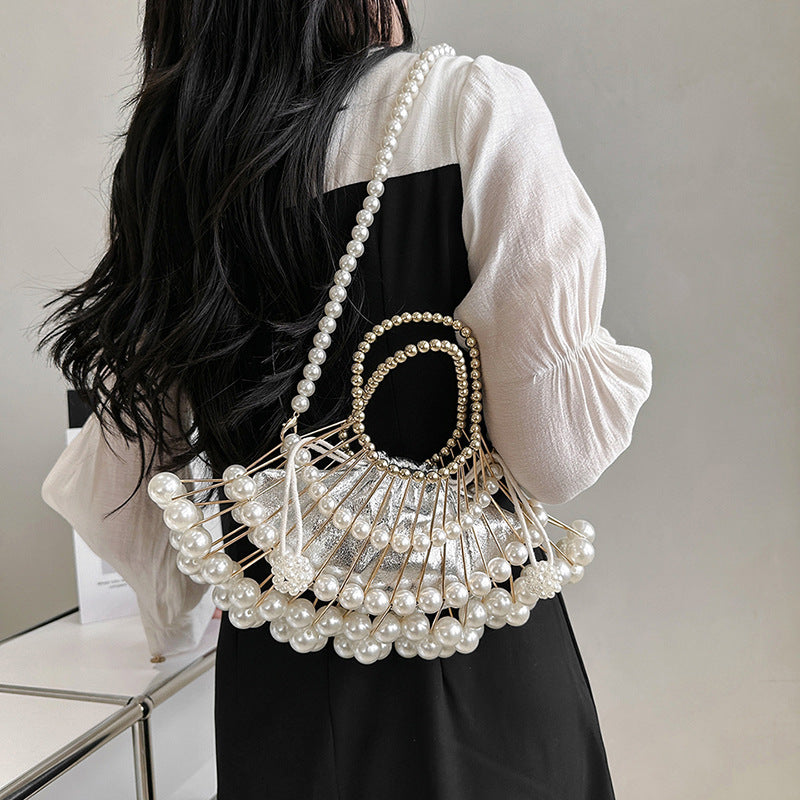 Spring Summer Retro Dinner Handbag - A Pleated Pearl Chain Diagonal Bag with Elegant Hollow-Out Design